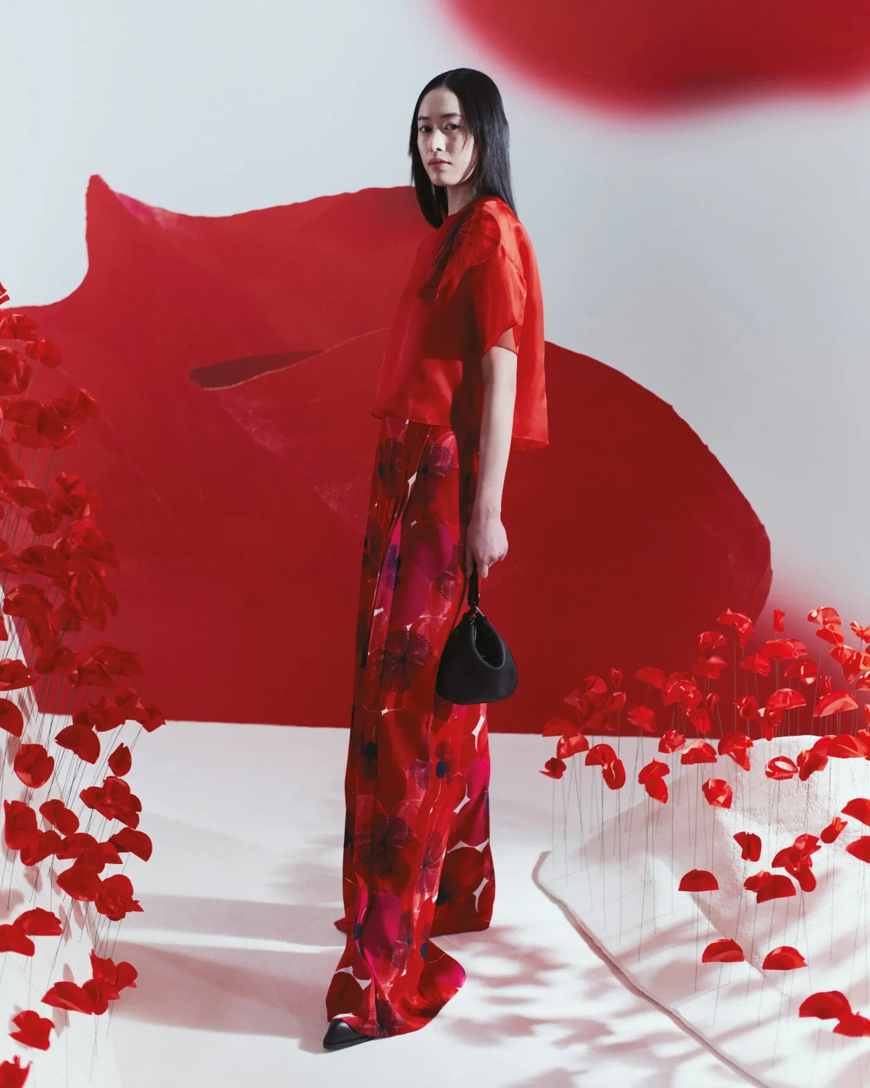Weite Plissee-Hose mit Poppy Druck